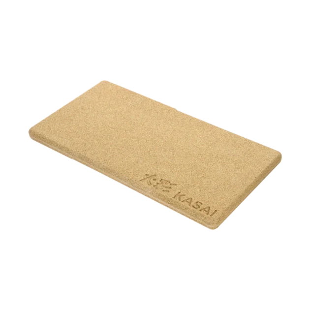 A beige Kasai Konro Heat Mat for Medium Long Grill laid flat on a surface.