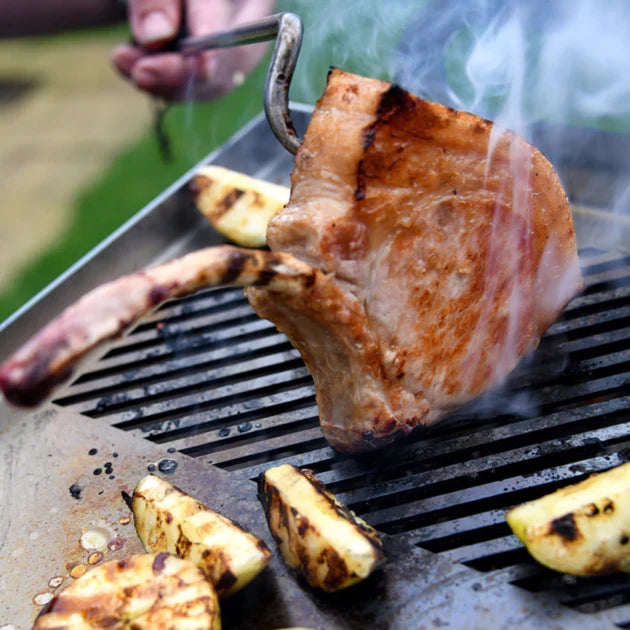 Pork chop with bacon on a Kasai Konro Plancha Nano with vegetables