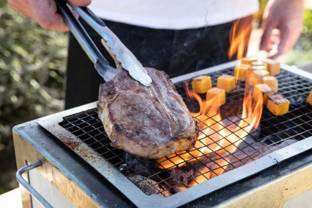 Meat being grilled on Kasai Mesh on top of Kasai Grill.