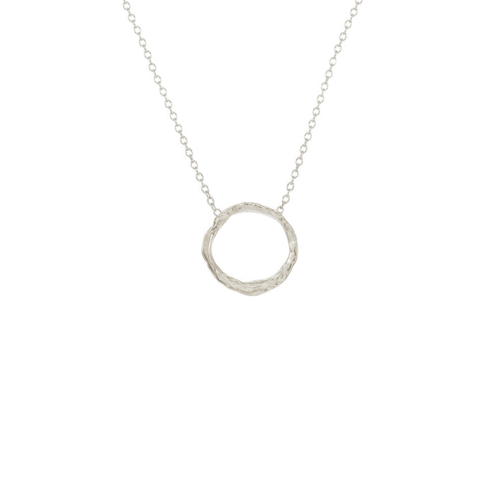 Delicate silver circle pendant necklace with a textured organic design on a fine chain, featuring the Small Opihi Circle Necklace | Catherine Weitzman Jewelry.