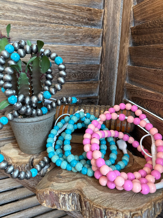 Beaded USB-C phone charger bundle with turquoise and pink bead strands and white tips