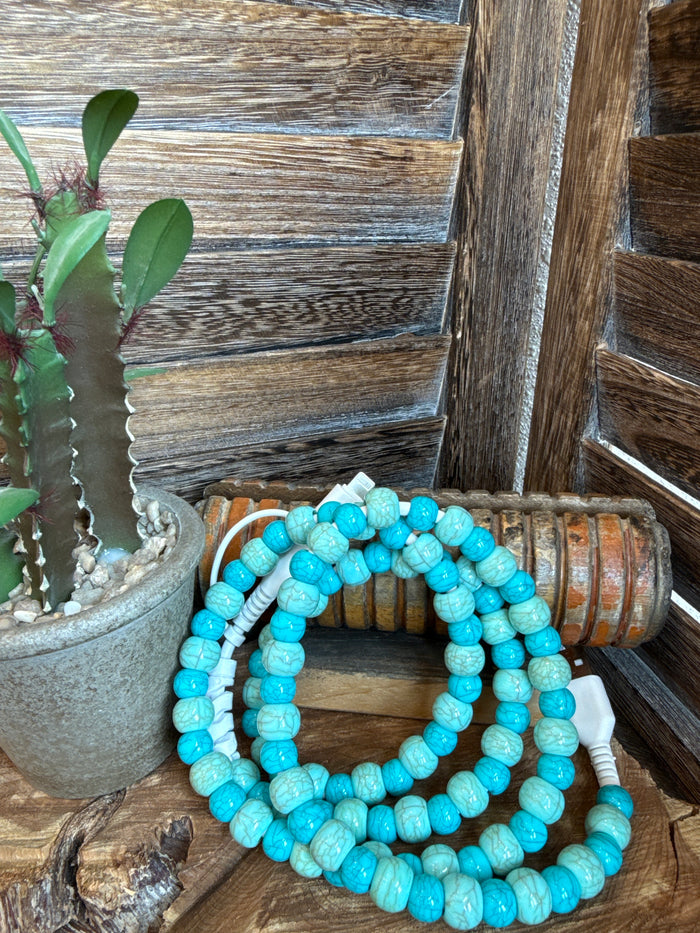Beaded USB-C phone charger with bright turquoise bead strands and white cable connector