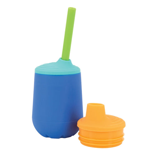 The Nuby US 3-Stage Training Cup Set | Blue is a colorful silicone toddler cup with interchangeable lids, including a green straw lid and an orange sippy lid—perfect for helping little ones learn to drink independently.