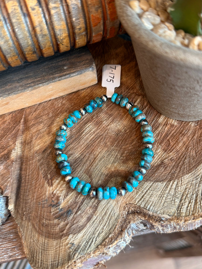 Turquoise bead stretch bracelet with dark silver spacer beads