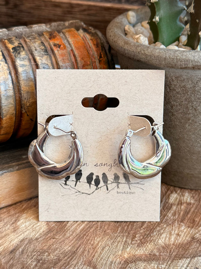 Silver curvy bumpy hoop stud earrings with iridescent inlay and hinged hoops