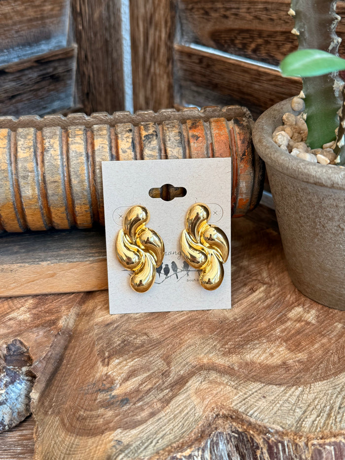 Gold-plated twisted teardrop stud earrings on white card