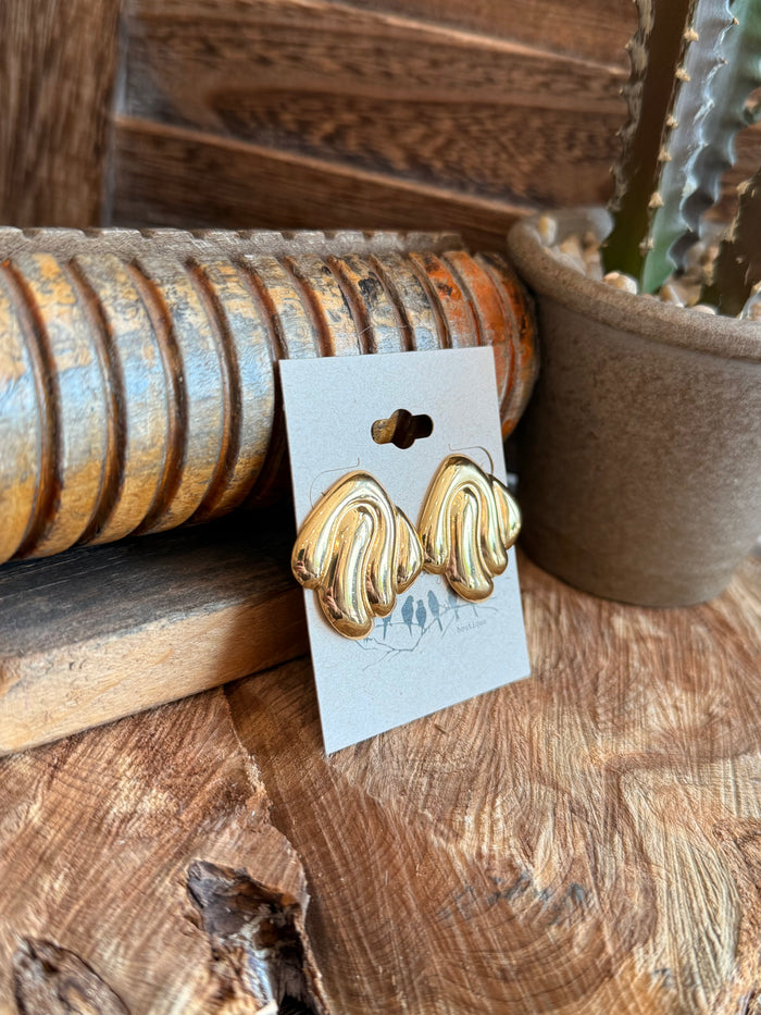 Gold wavy swirl stud earrings, stainless steel pair with rounded fronts