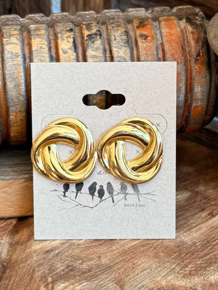 Gold-plated whirling stud earrings with twin twisted spiral loop fronts