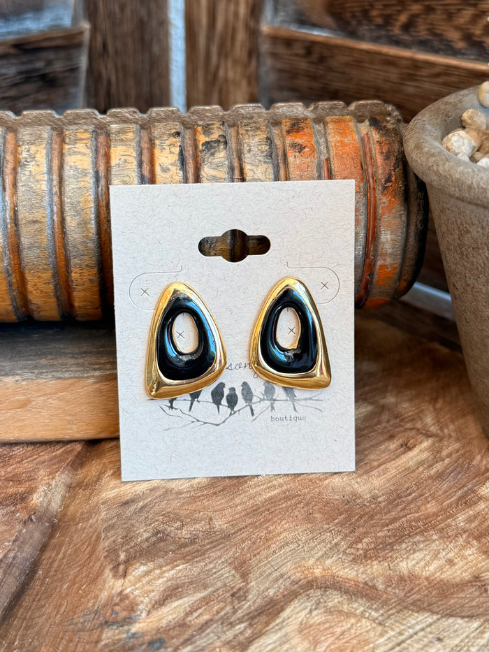 Pair of gold-tone stud earrings with dark blue teardrop stones, glossy finish