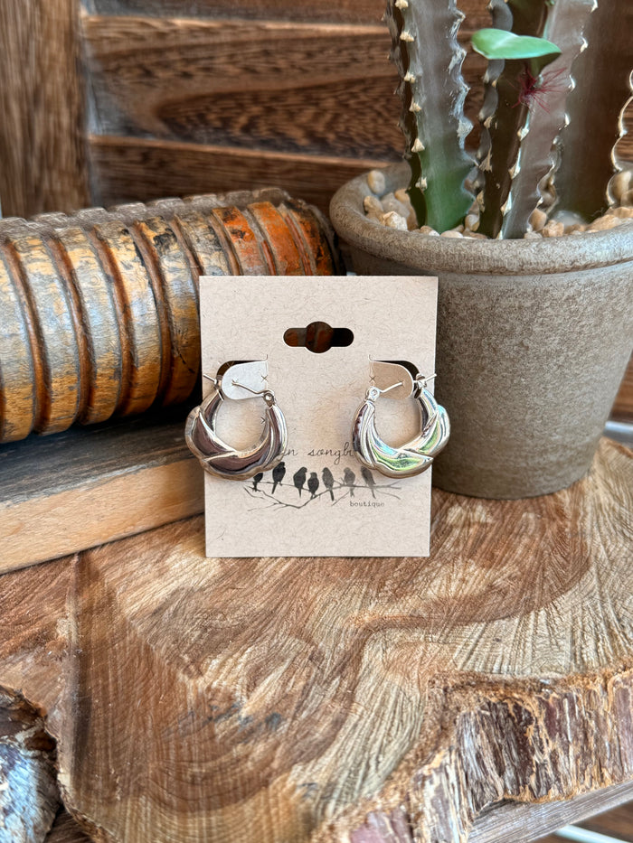 Silver stainless hoop stud earrings with curved bumpy texture, small open hoops