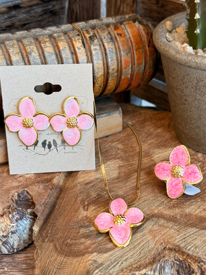 Pink floral stud earrings and matching flower pendant on thin gold-tone necklace chain