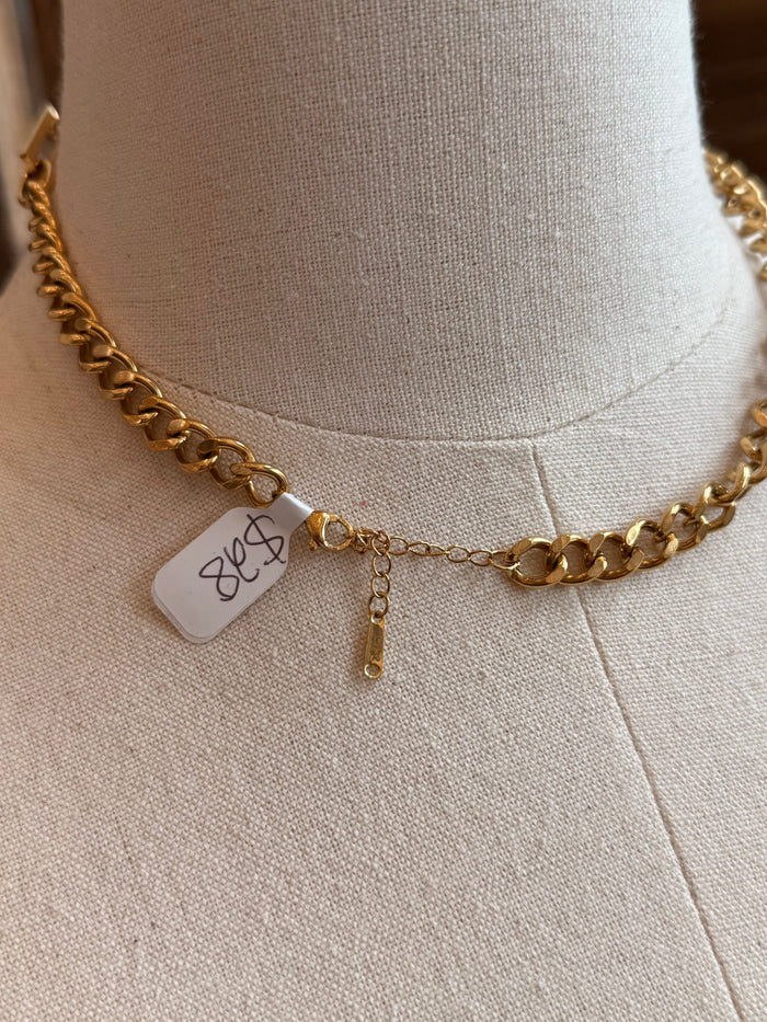 Gold plated chain necklace with big and small links plus small tag charm and drop