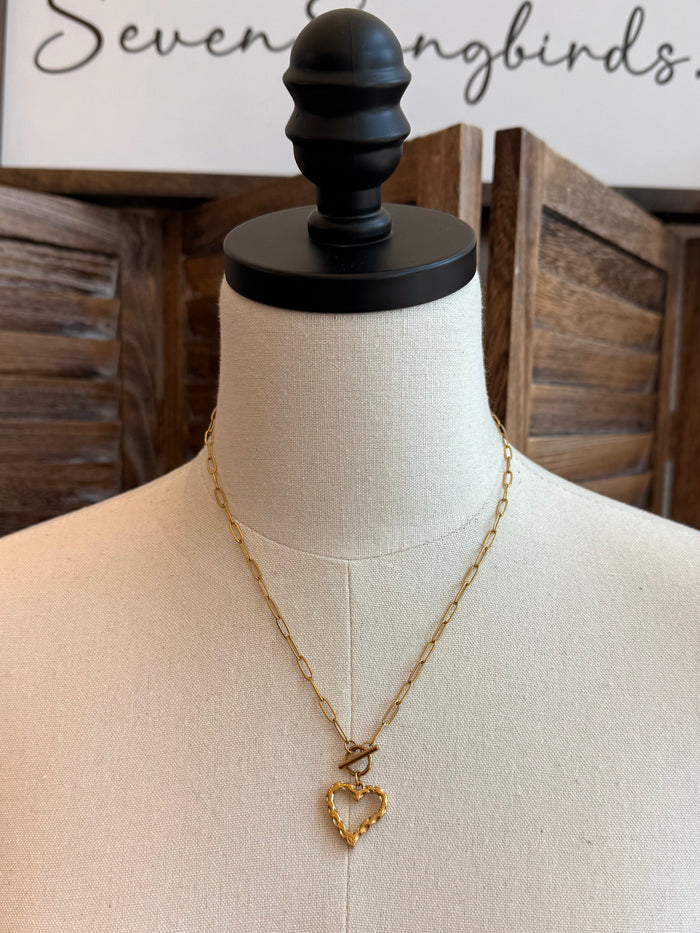 Gold-plated heart toggle clasp necklace with chain and heart-shaped pendant