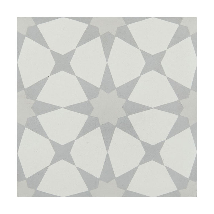 Geometric patterned tile with white and gray shapes on a white background