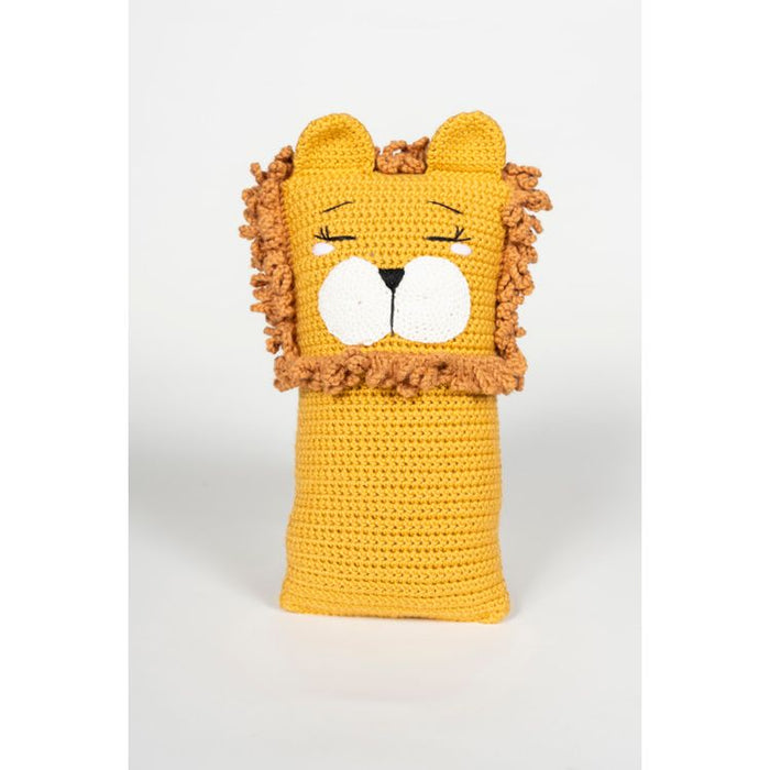 Crocheted lion-shaped pillow on a white background