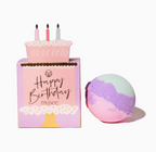 Birthday-themed bath bomb with packaging and a colorful bath bomb on a white background