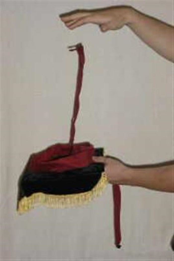 Cobra Tie - A Borrowed Tie is Coiled on a Tray and Rises Like a Cobra!