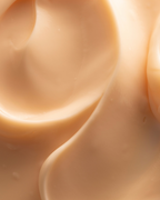 Close-up of smooth creamy texture representing Dream Bio-Retinol + Shorea Butter Rejuvenating Cream | Three Ships, highlighting skincare and body care softness.