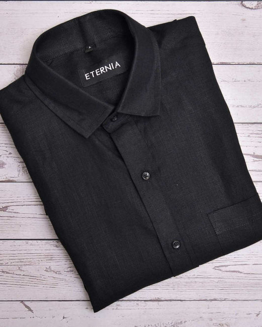 Black men's linen shirt with button front, pointed collar, and ETERNIA neck label