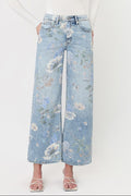 Floral light-wash denim jeans with wide-leg fit and front button closure