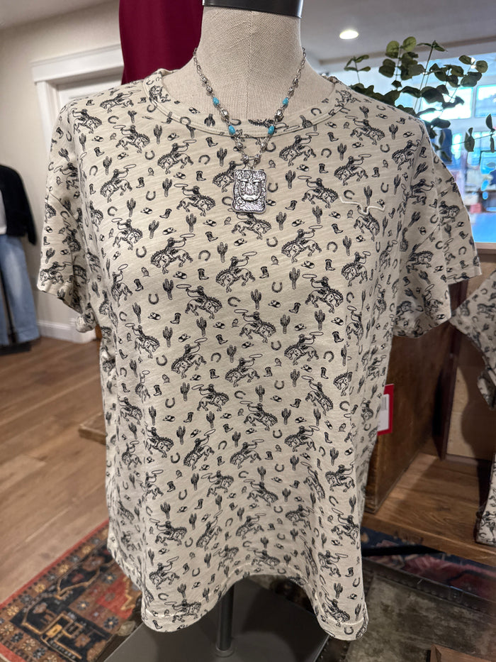 Light tan graphic T-shirt with black cowboy and cactus pattern, crew neck