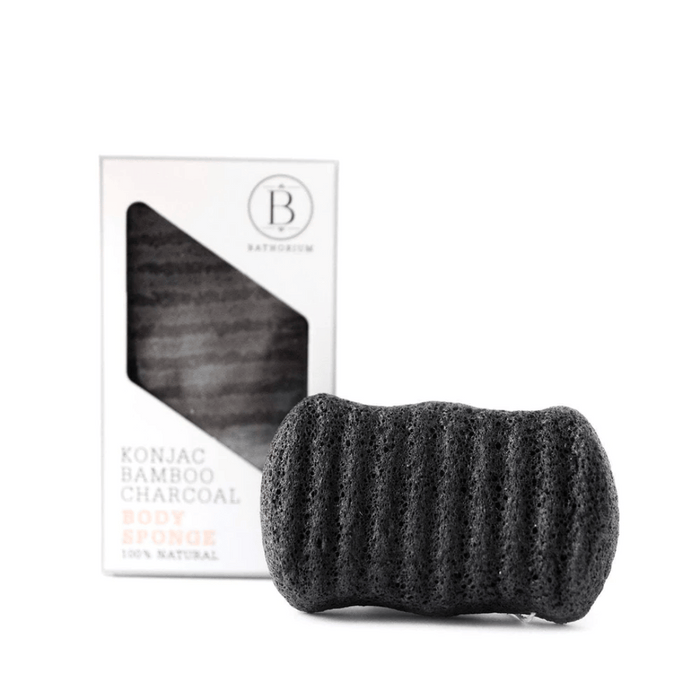 Konjac Bamboo Charcoal Body Sponge | Bathorium shown in black with textured surface next to its white packaging box, designed for natural skincare and body care.