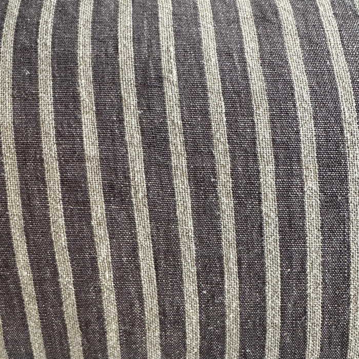 Close-up of black and white striped fabric cushion