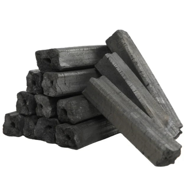 sumi bincho kasai charcoals stacked on each other on white background.
