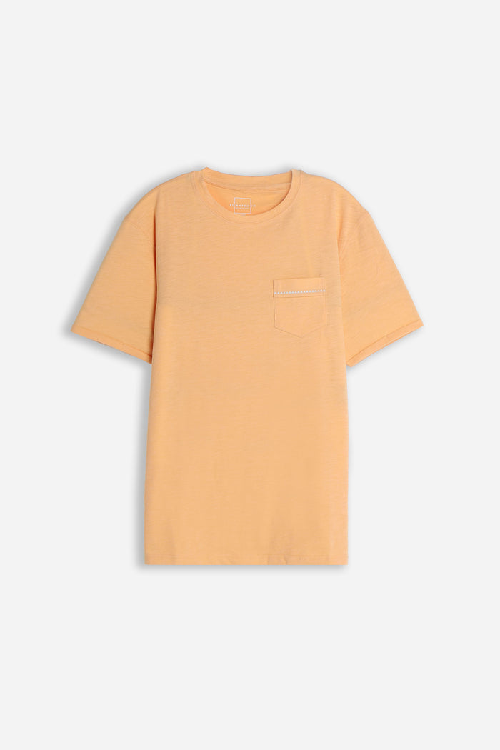 T-SHIRT GIROCOLLO SLUB  CON TASCHINO ALBICOCCA