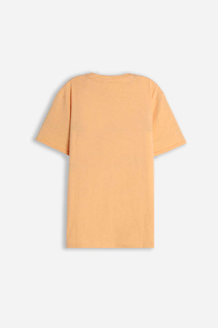 T-SHIRT GIROCOLLO SLUB  CON TASCHINO ALBICOCCA