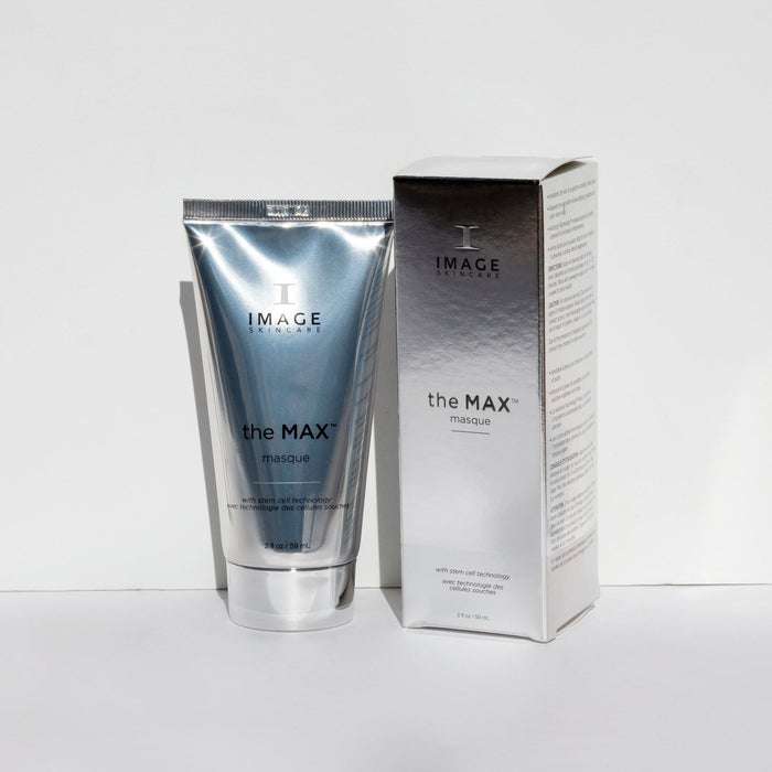 Silver tube and matching box of the MAX™ masque | IMAGE Skincare, a skincare product designed for facial treatment and rejuvenation.